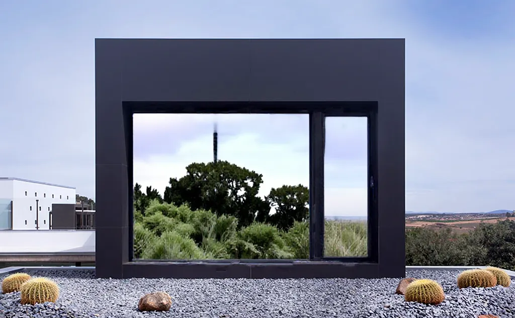A large picture window before and after reflective film